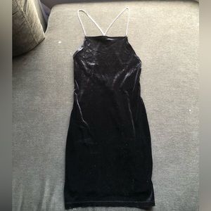 Black mini dress with Diamond straps.